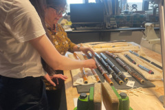 Laura Piras looking at historical flutes from the collection at St Cecilia